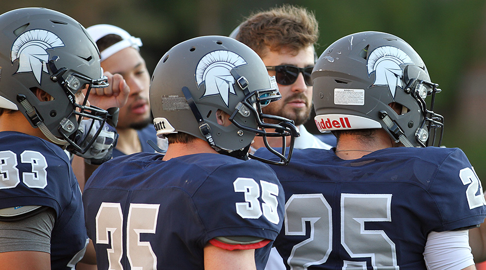 Kevin Burke in the background behind Case players