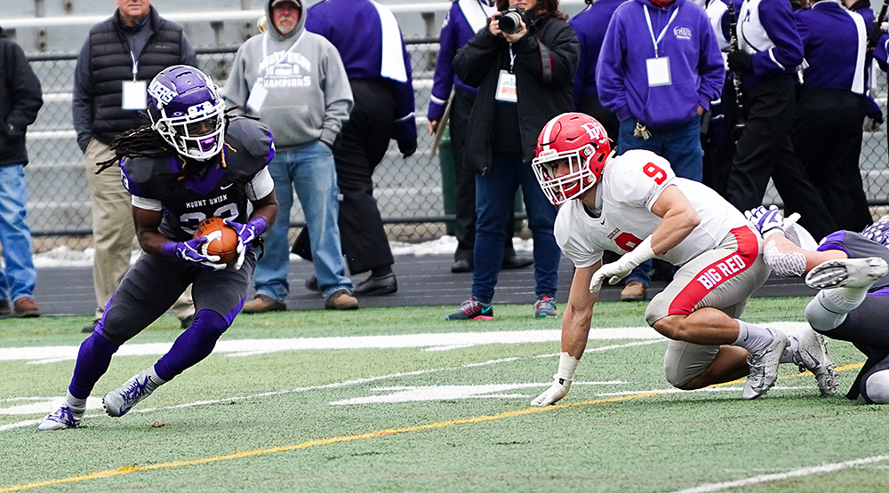 Louis Berry has the ball in his hands, looking to score. (Photo by Dan Poel, Ohiosi.com)